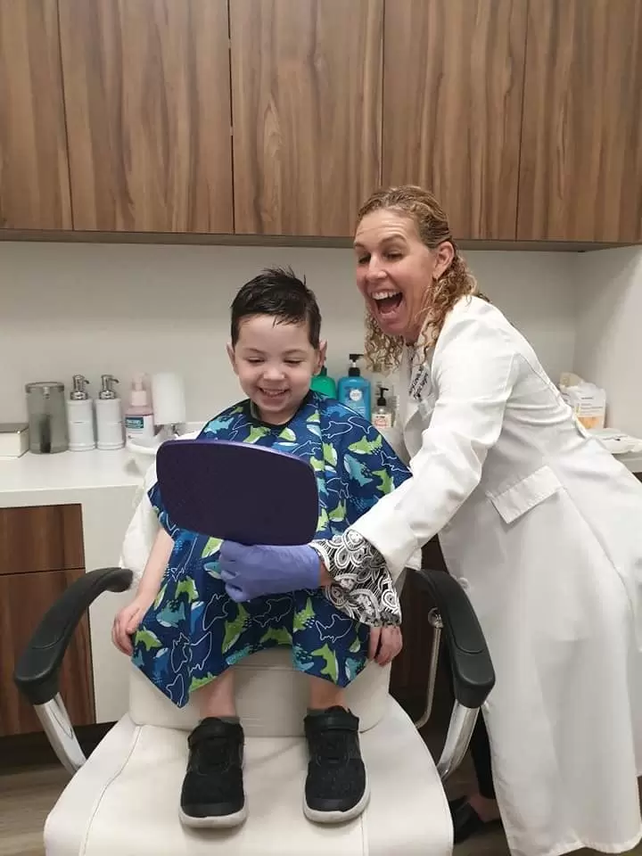 Grant recipient Jack seeing his new years for the first time with huge smile on his face