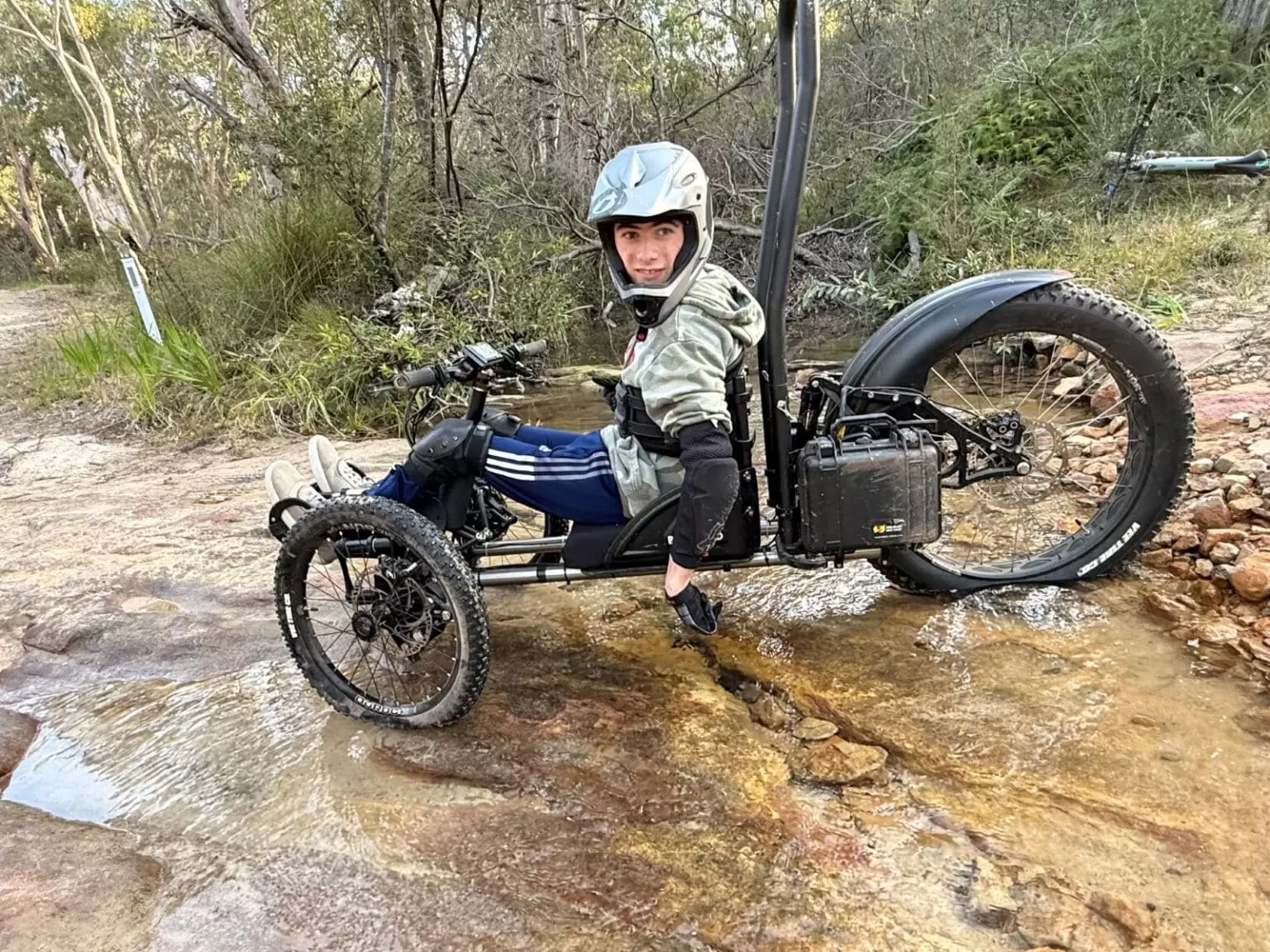 Grant story Cale riding his specialised bike